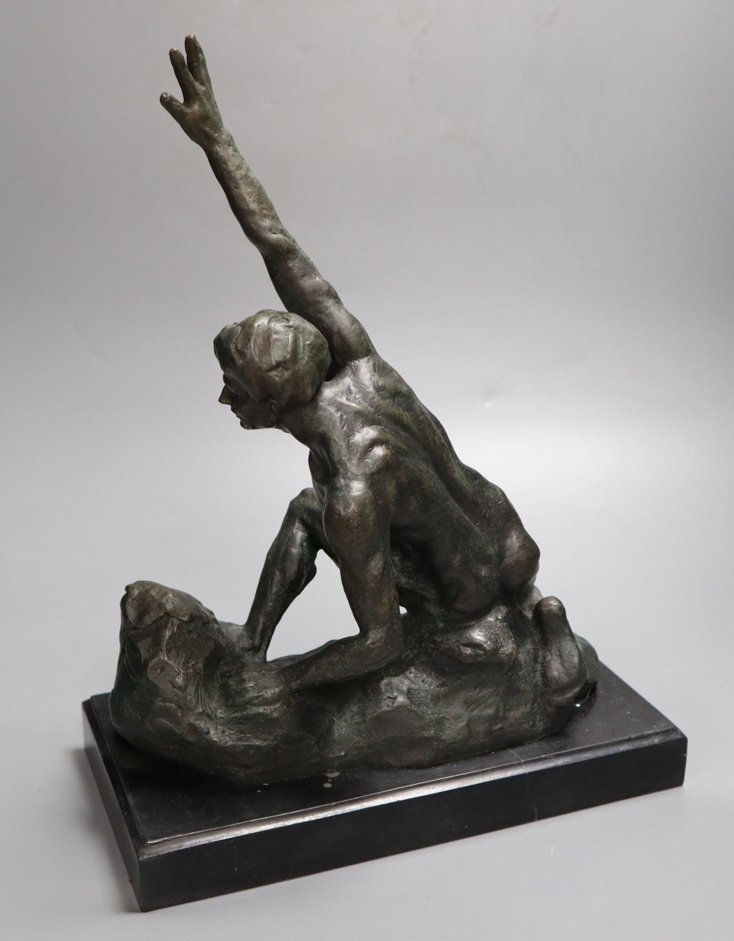 A bronze of a nude male, on marble base, indistinctly signed, height 36cm